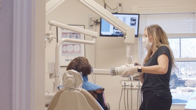 Dentist capturing digital images for CEREC same day dental crowns