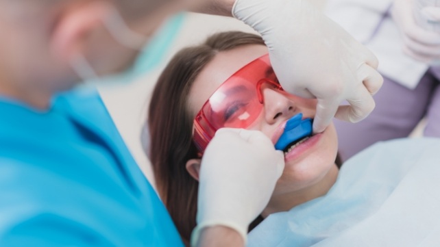 Patient receiving fluoride treatment